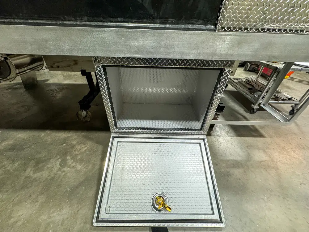 Open compartment interior during fabrication, photo 164 of 303.